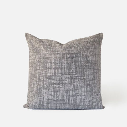 Decorative Threads Grey textured cushion, front view on a white background.