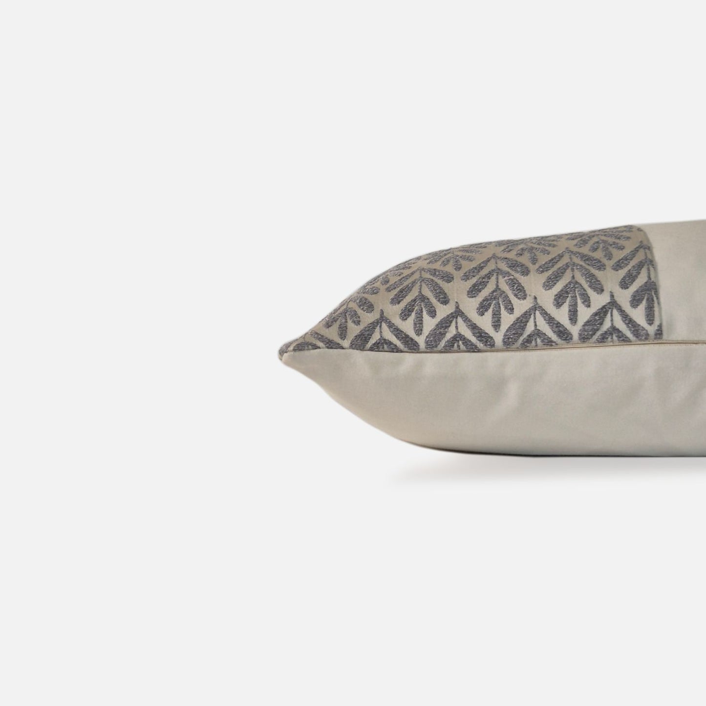 Decorative Threads Willow cushion cover in silver with a foliage woven design, side view