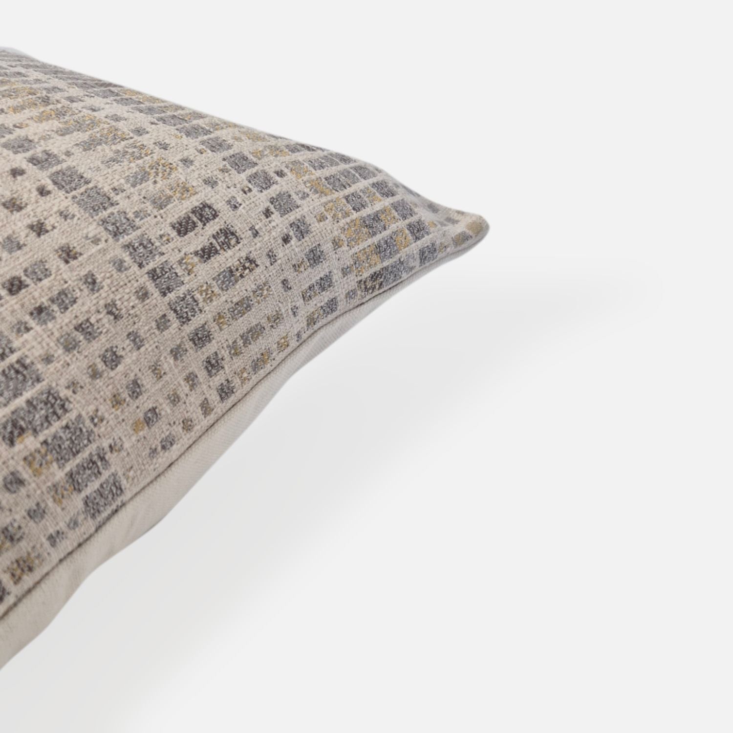 Decorative Threads Geometric Abstract cushion cover combo . Luxe duo set featuring rich honey coloured velvet paired with a contemporary abstract weave, corner of abstract weave on white background.