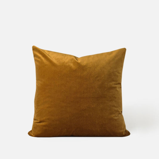 Decorative Threads Geometric Abstract cushion cover combo . Luxe duo set featuring rich honey coloured velvet paired with a contemporary abstract weave, front of honey velvet on white background.