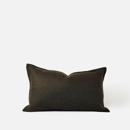 Olive green rectangle breakfast cushion pillow cover in a textured woven wool blend. This dark green decorative pillow cover is ideal for luxury home decor and modern sofa styling.