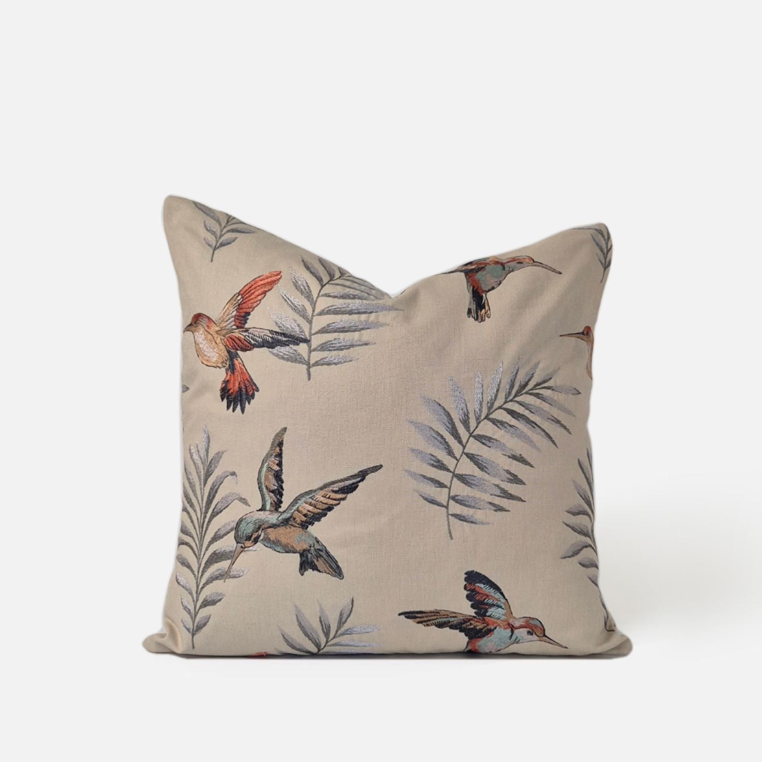 Avian Multi-Embroidered Square Cushion Cover, 50x50cm. High-end botanical bird and floral motif in terracotta and blue on a neutral base by Decorative Threads NZ.