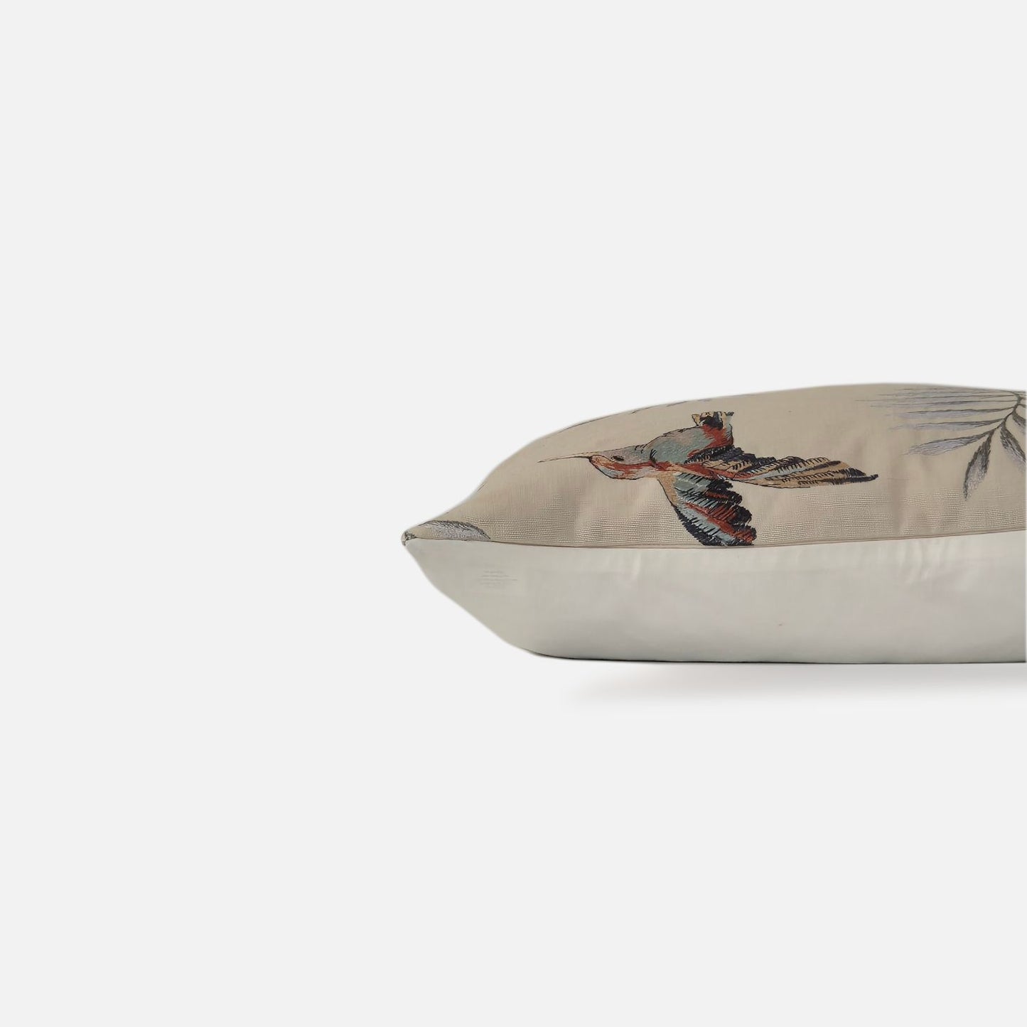 Side view of the Avian cushion cover highlighting the botanical bird pattern, premium fabric weight and seamless hidden zipper construction.