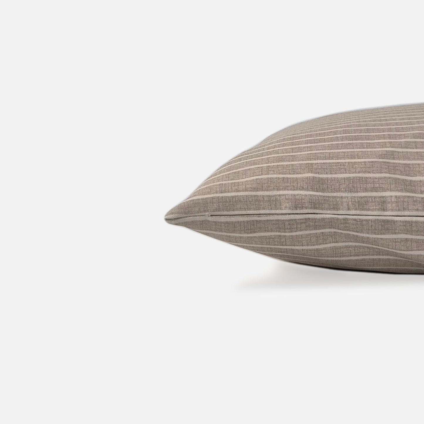 Azure cushion cover side view on a white background