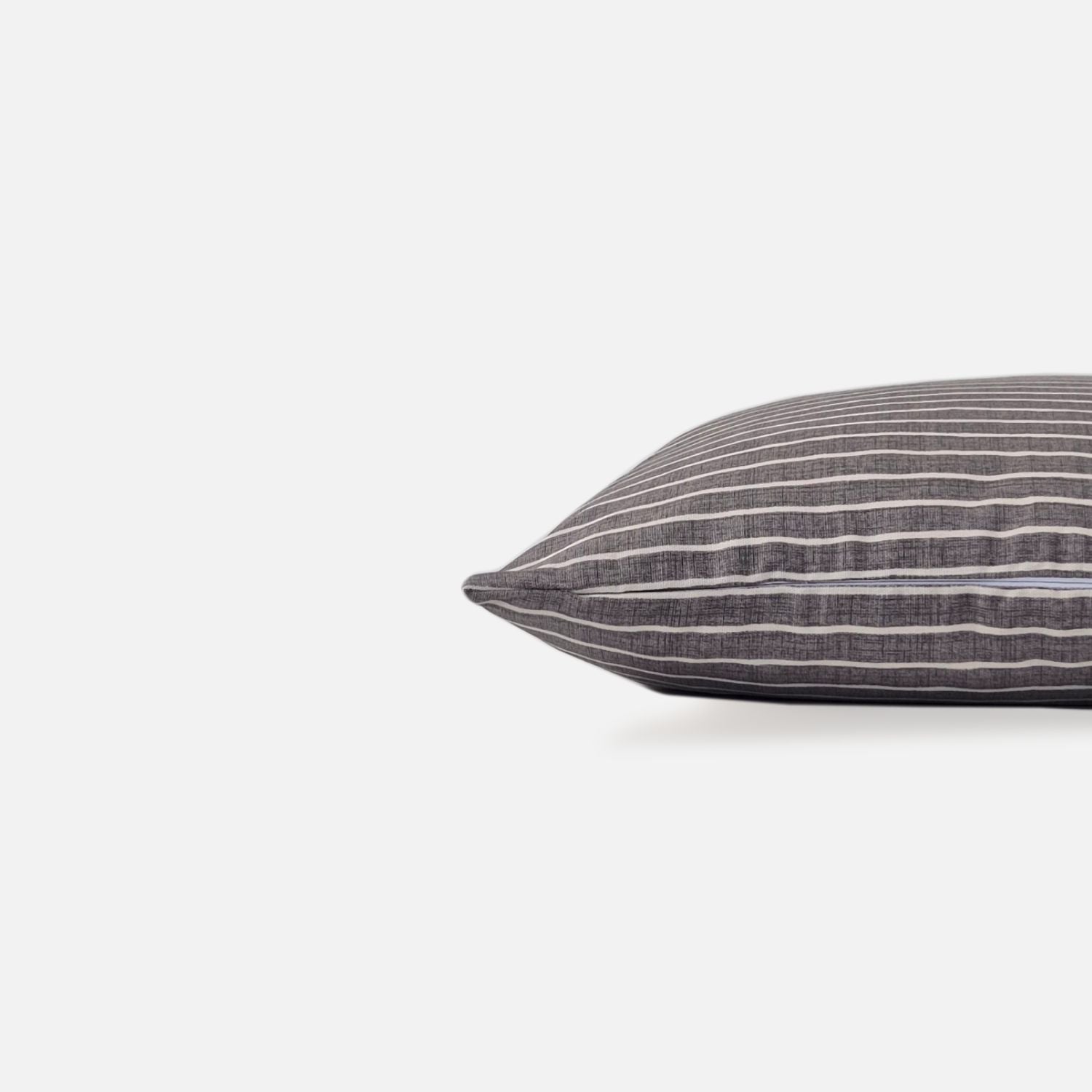 Azure pewter cushion cover side view on a white background