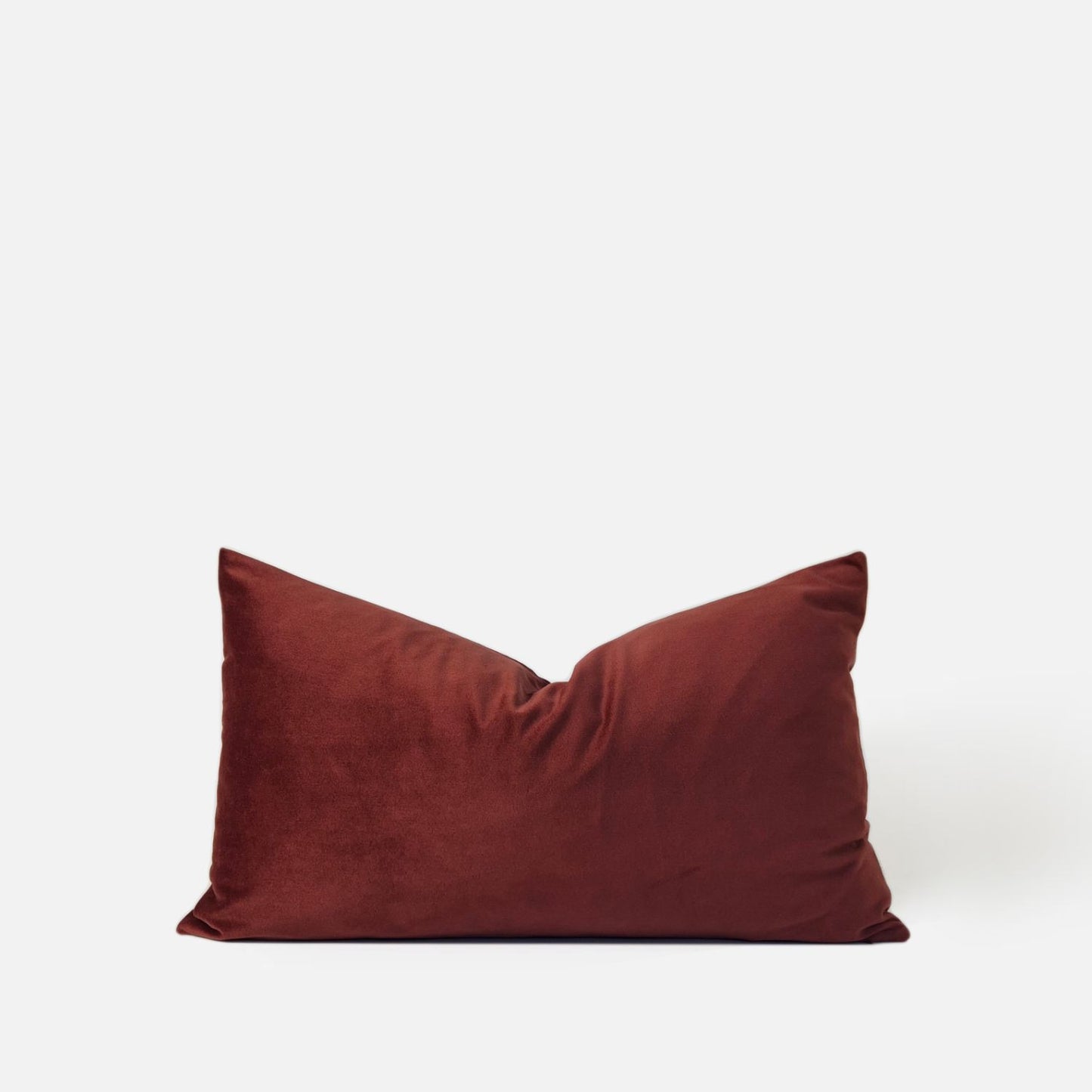 Red velvet breakfast cushion, front view on a white background
