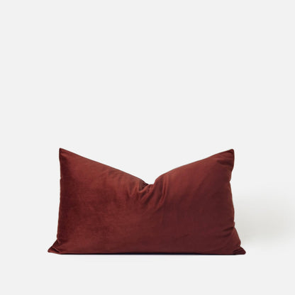 Red velvet breakfast cushion, front view on a white background