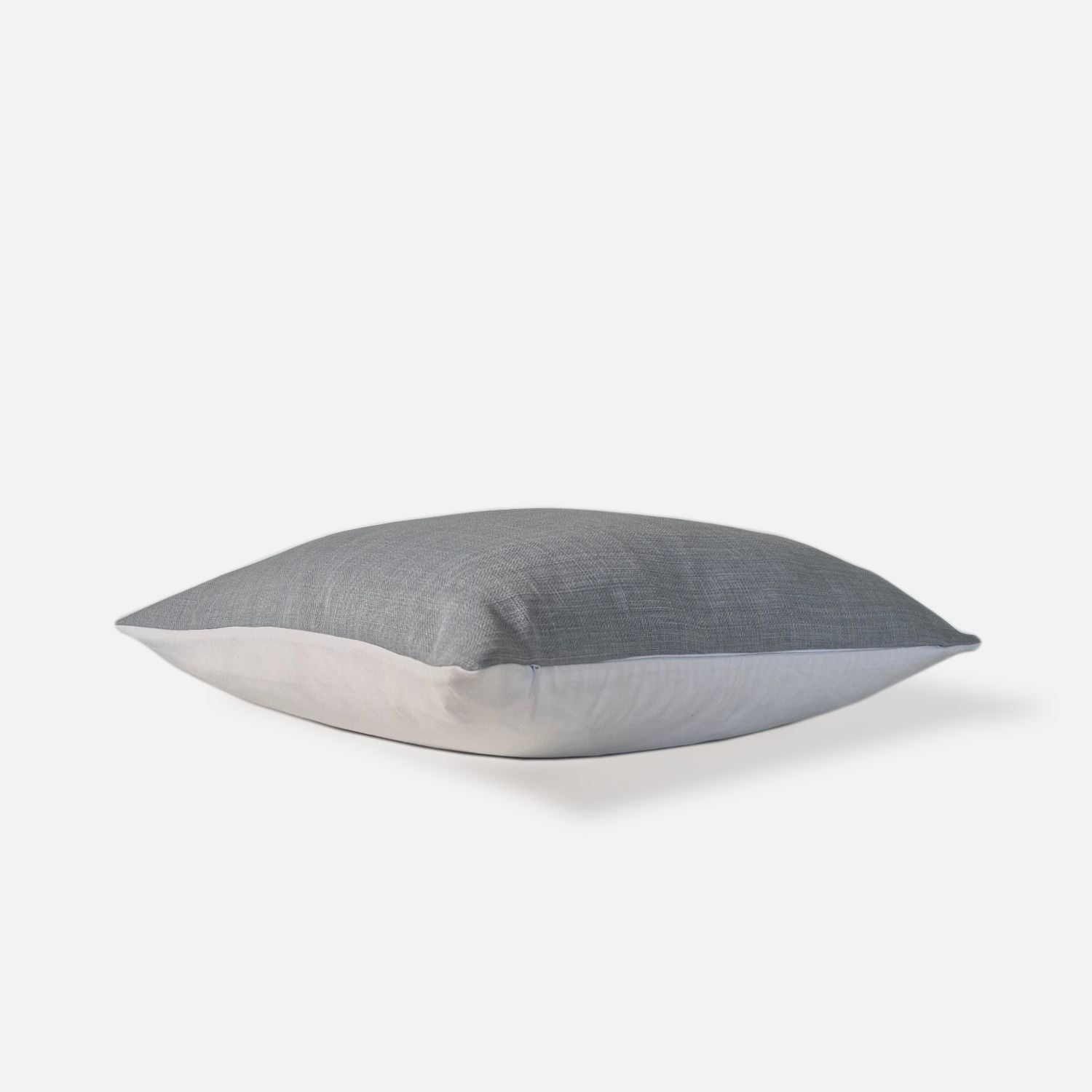 blue plain woven cushion, top view on a white background