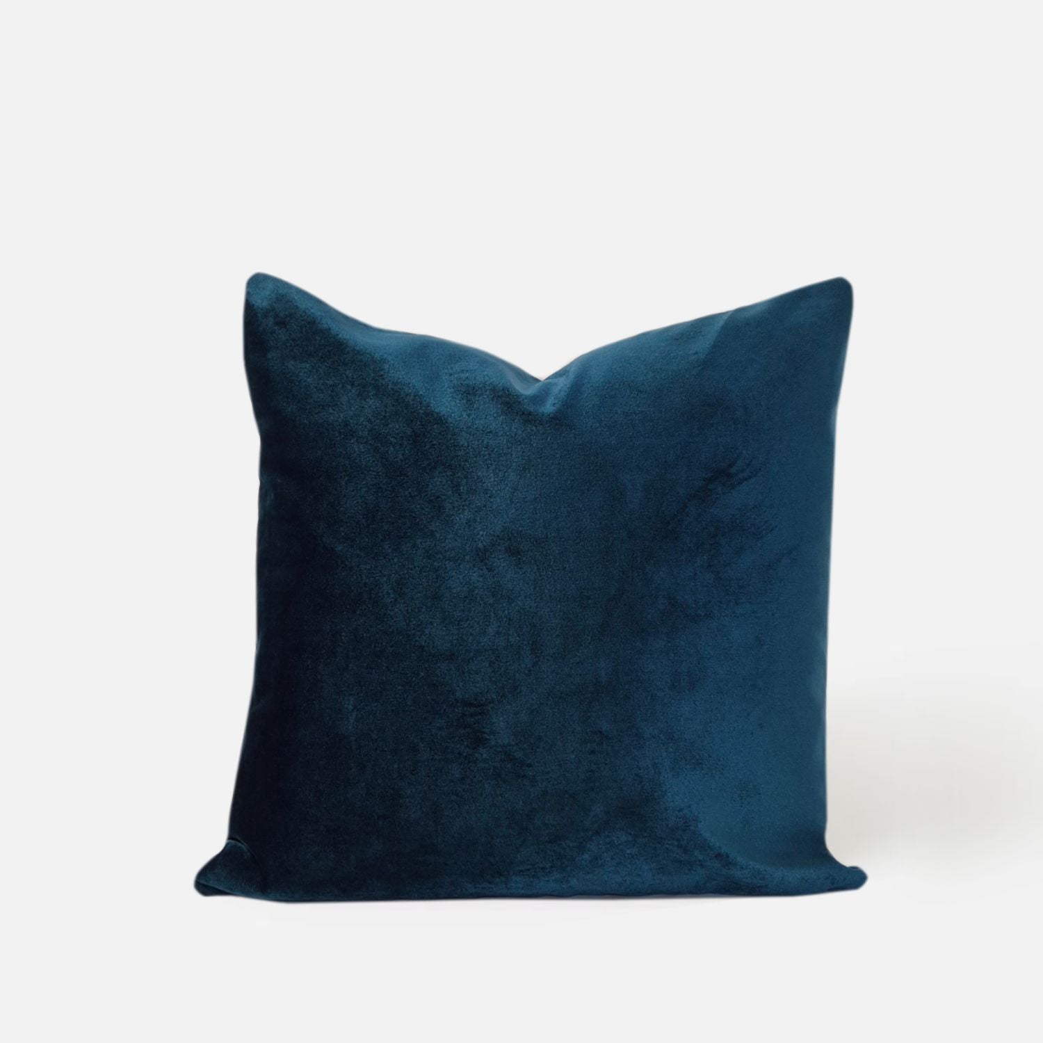 Decorative Threads Peacock coloured cushion, front view on a white background.