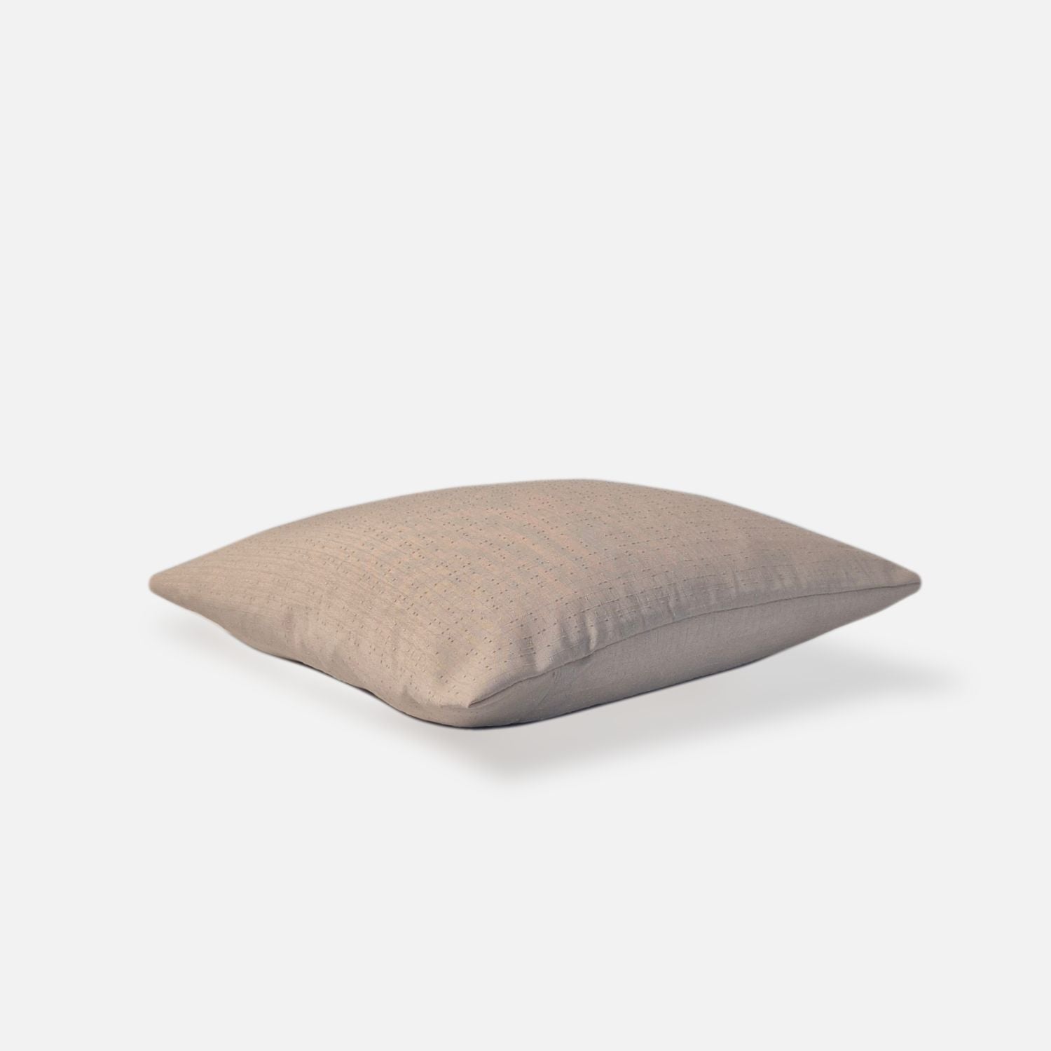 antique beige woven cushion with pattern, top view on a white background