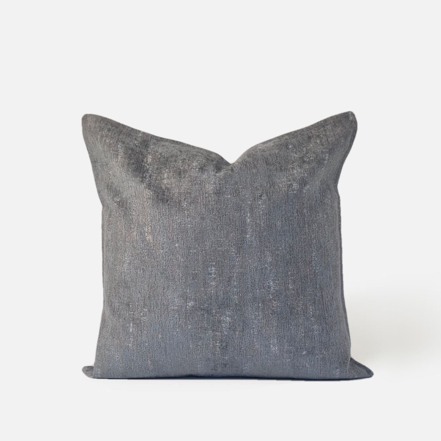 Plain chenille blue green cushion, front view on a white background