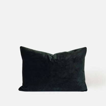 Decorative Threads Dark green, emerald velvet cushion, front view on a white background.