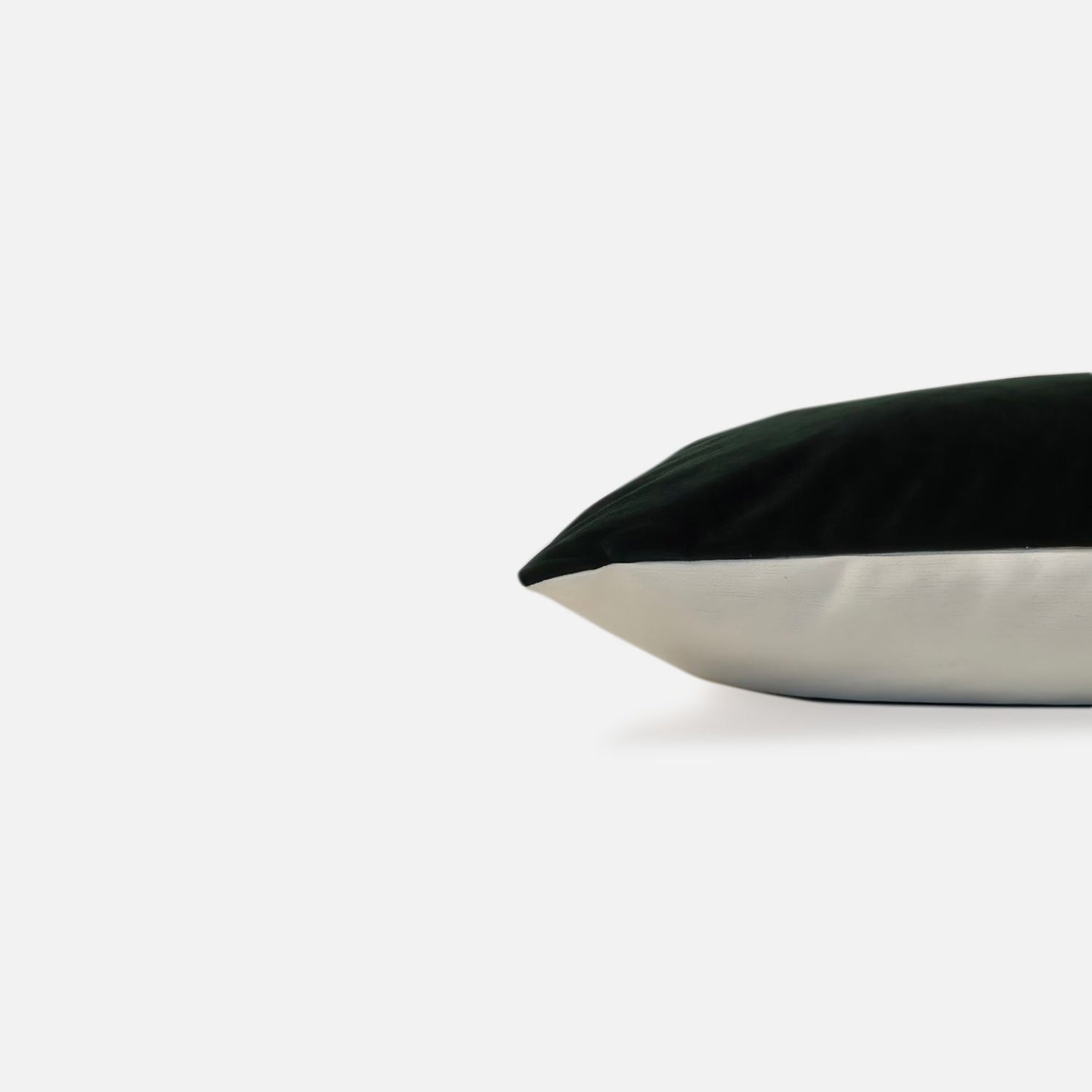 Decorative Threads solid emerald, green velvet cushion cover, side view on a white background. 