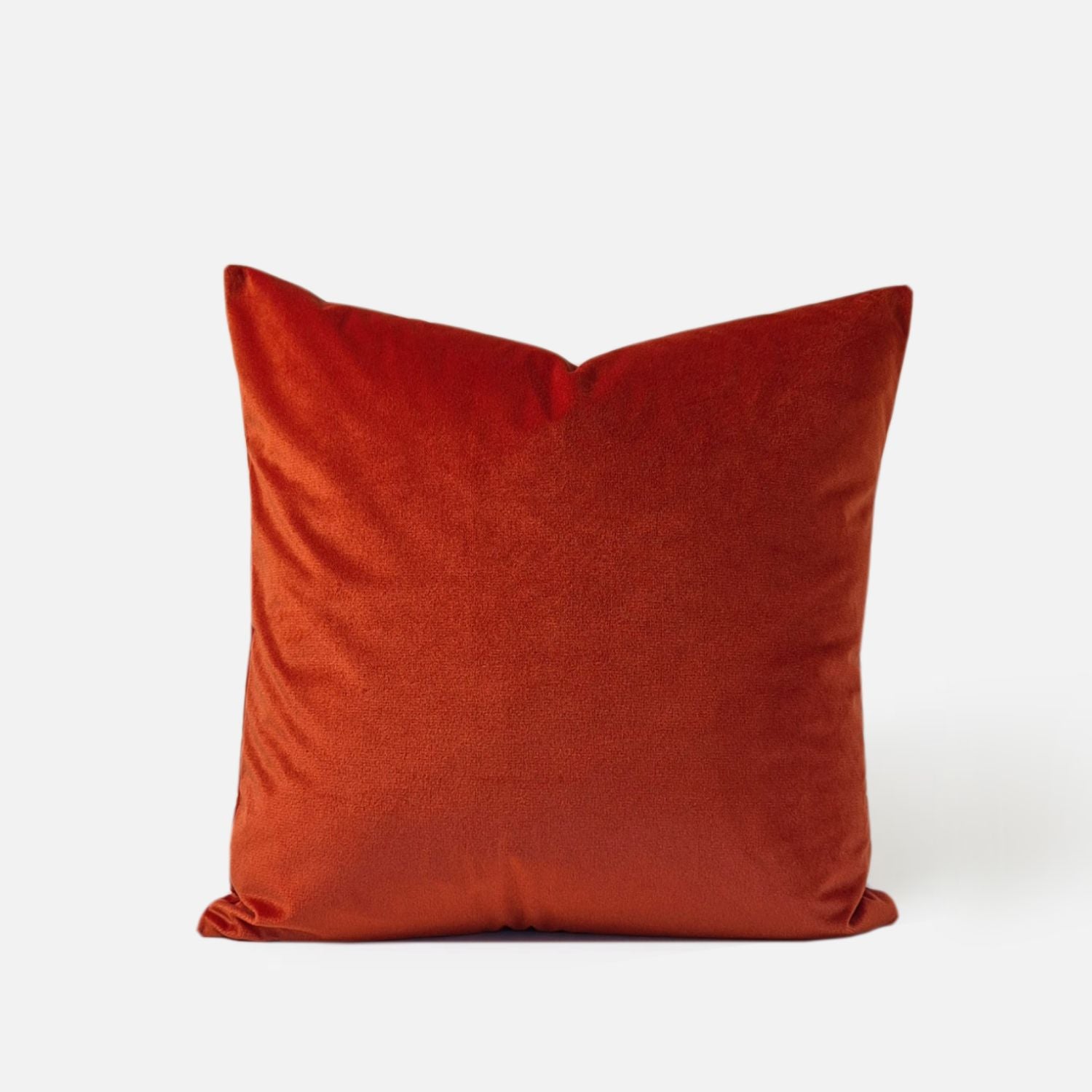 Decorative Threads Ensemble Spice cushion cover combo. Front view of Sienna coloured cushion, on a white background.