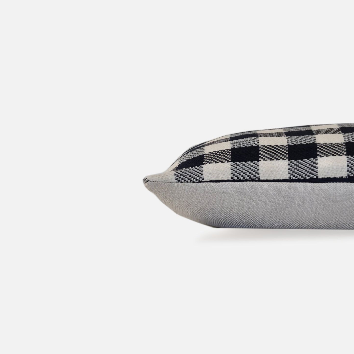 Blue and white checkered cushion, side view on a white background