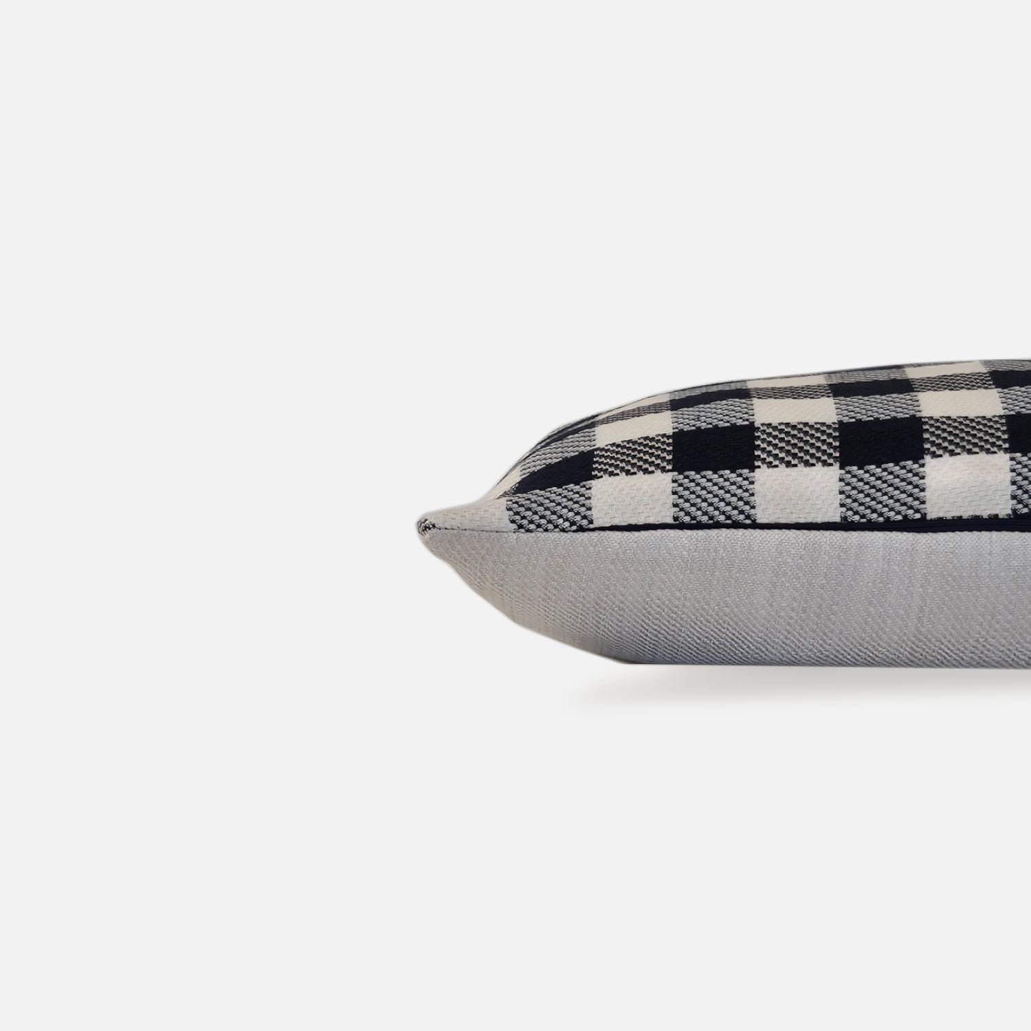 Blue and white checkered cushion, side view on a white background