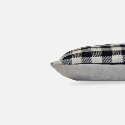 Blue and white checkered cushion, side view on a white background