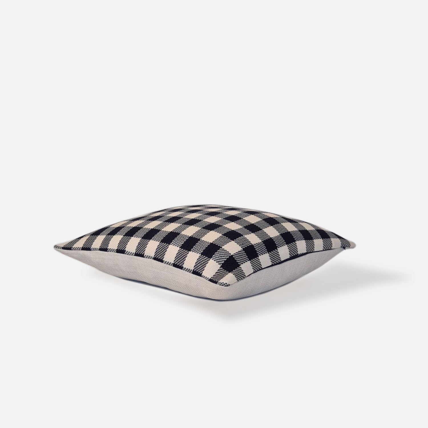 Blue and white checkered cushion, top view on a white background