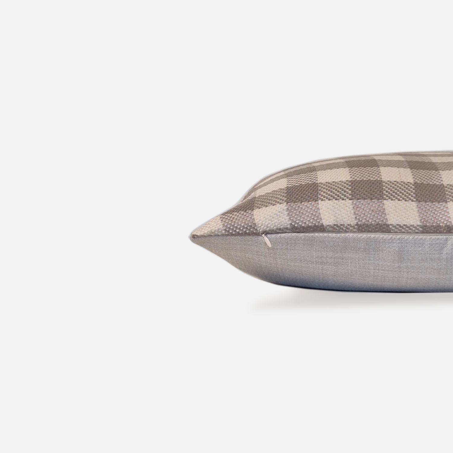 Sand checkered cushion, side view on a white background