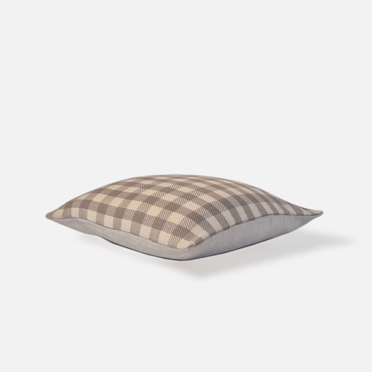 Sand checkered cushion, top view on a white background