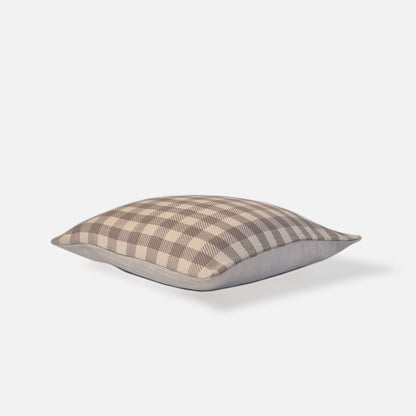 Sand checkered cushion, top view on a white background