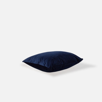 Decorative Threads Navy blue cushion, top view a white background.