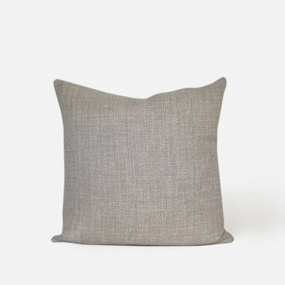 Decorative Threads Natural Cushion, front view on a white background.