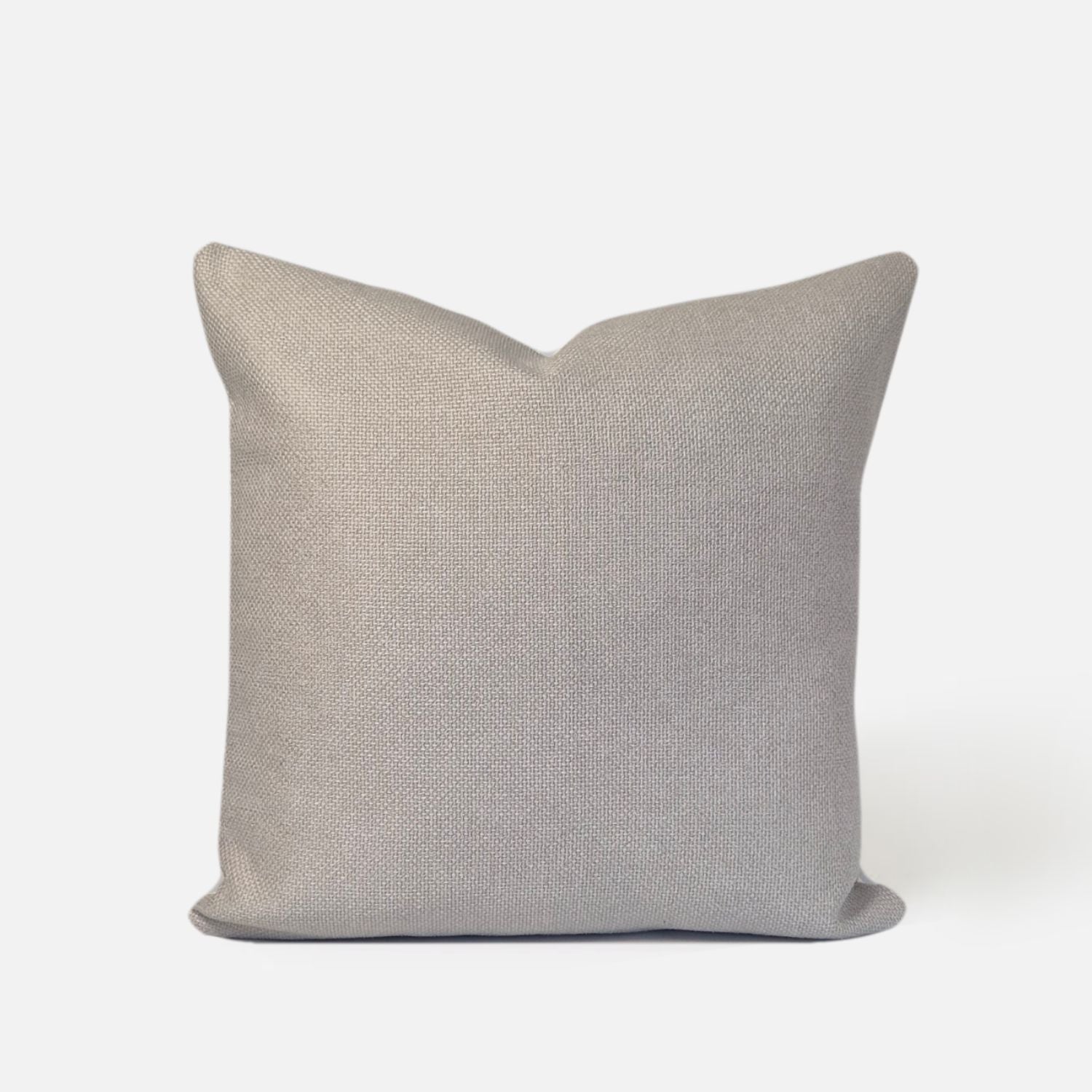 Decorative Thread Ida cushion cover in oatmeal with a woven texture, front view on a white background