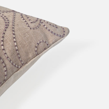 Decorative Threads Indie cushion cover in oatmeal, corner view on a white background