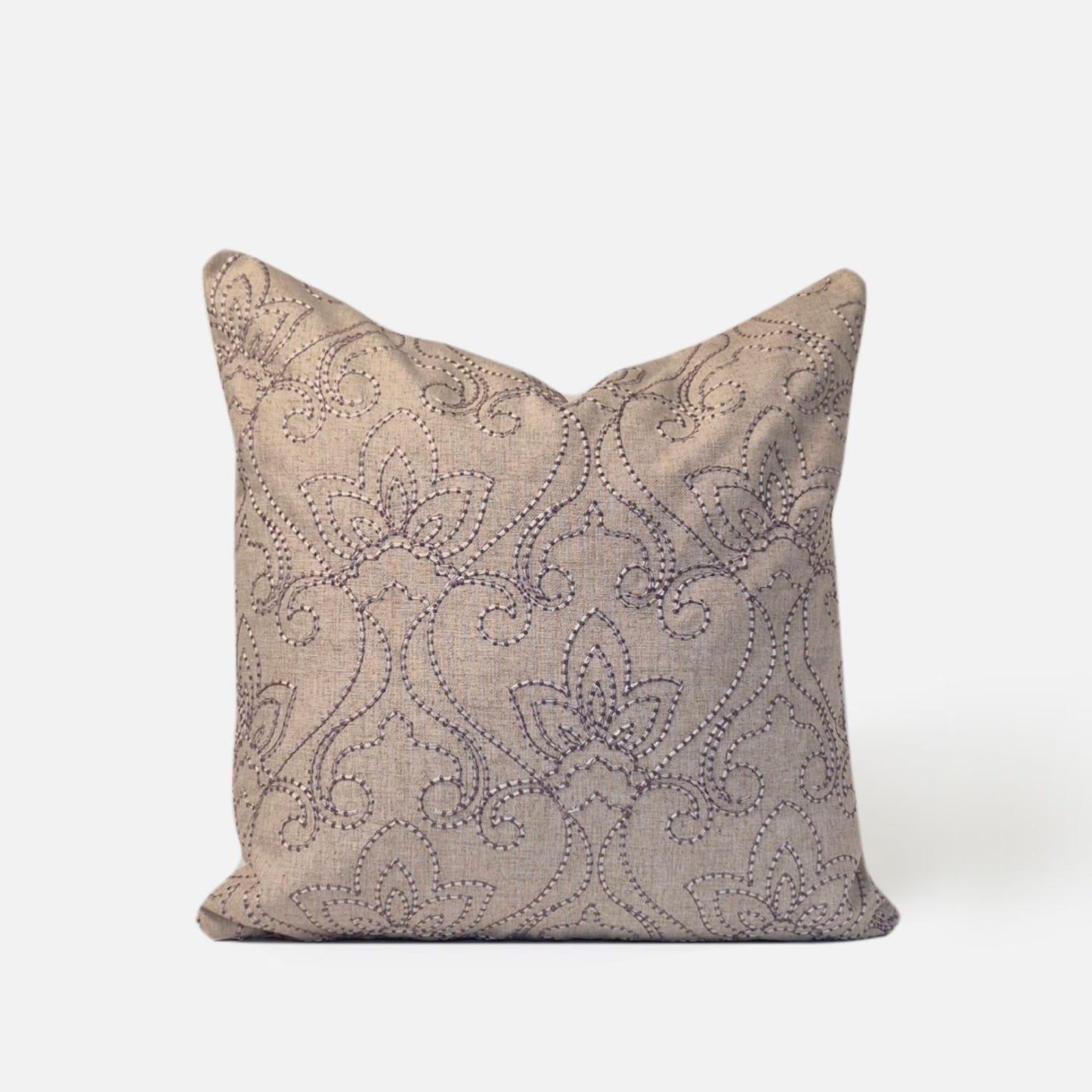 Decorative Threads Indie cushion cover in oatmeal, front view on a white background