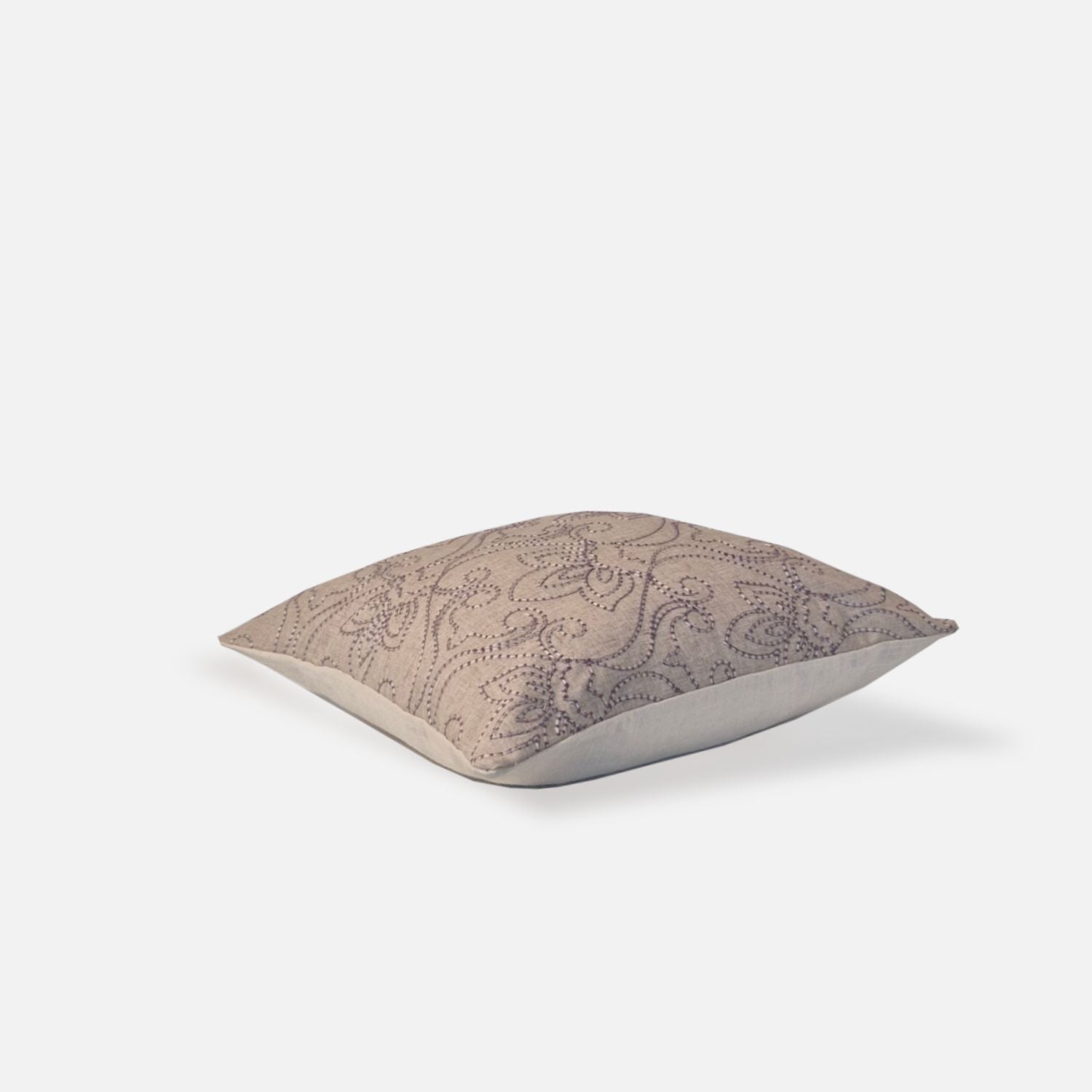 Decorative Threads Indie cushion cover in oatmeal, top view on a white background