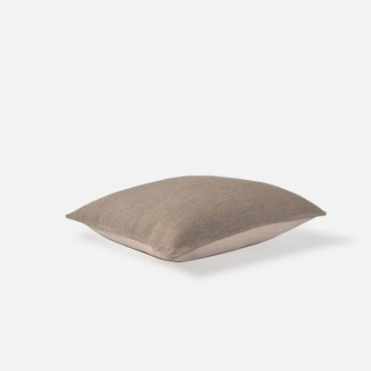 Decorative Threads Katama cushion cover in Brulee with a structured weave pattern, top view on a white background