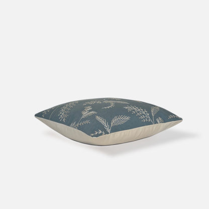 Decorative Threads Medley cushion cover in dusty turquoise with a embroidered botanical design, top view on a white background