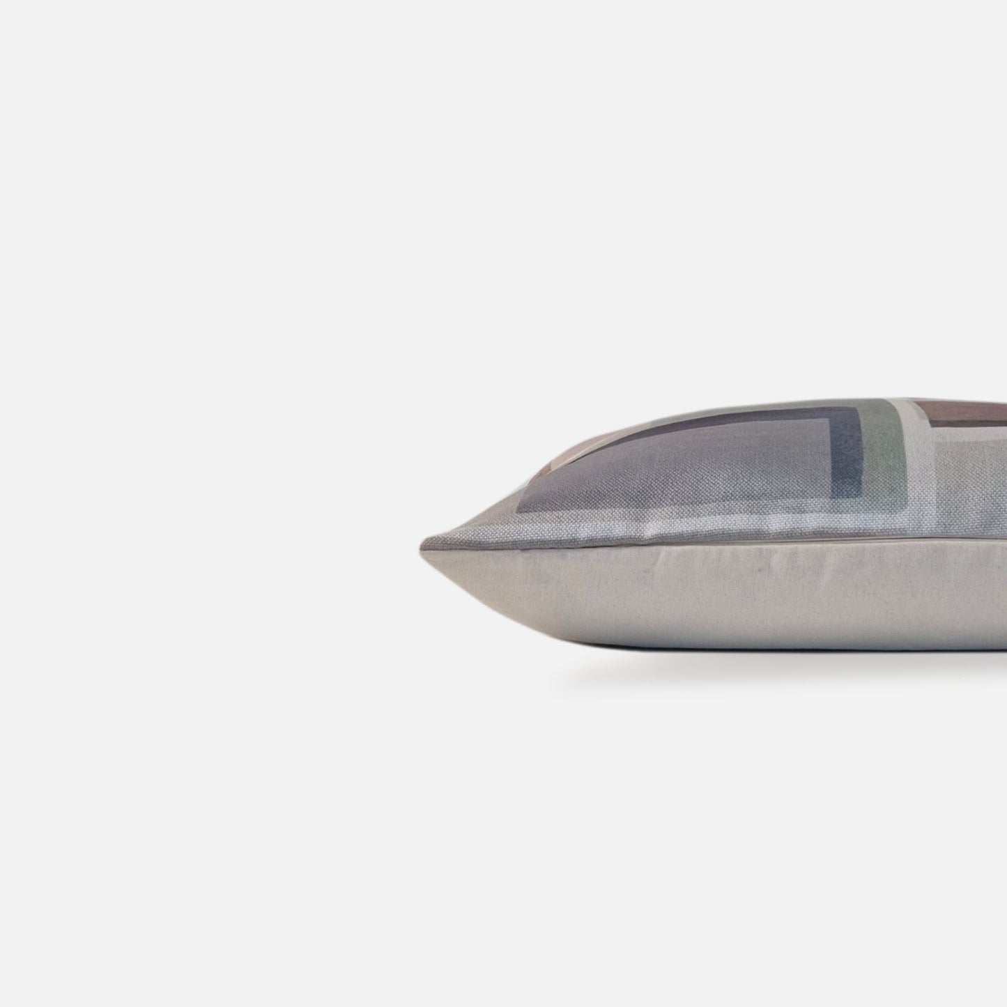 Decorative Threads Nebula cushion cover in multi colour with a printed abstract design, side view on a white background