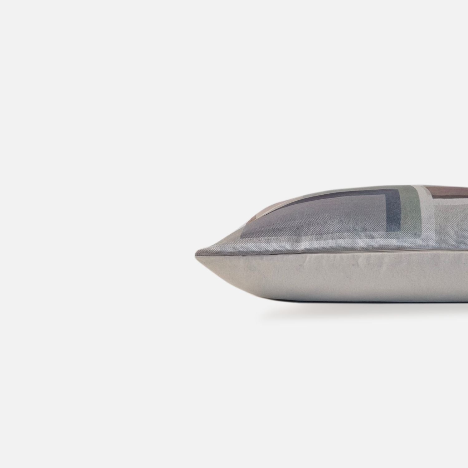 Decorative Threads Nebula cushion cover in multi colour with a printed abstract design, side view on a white background