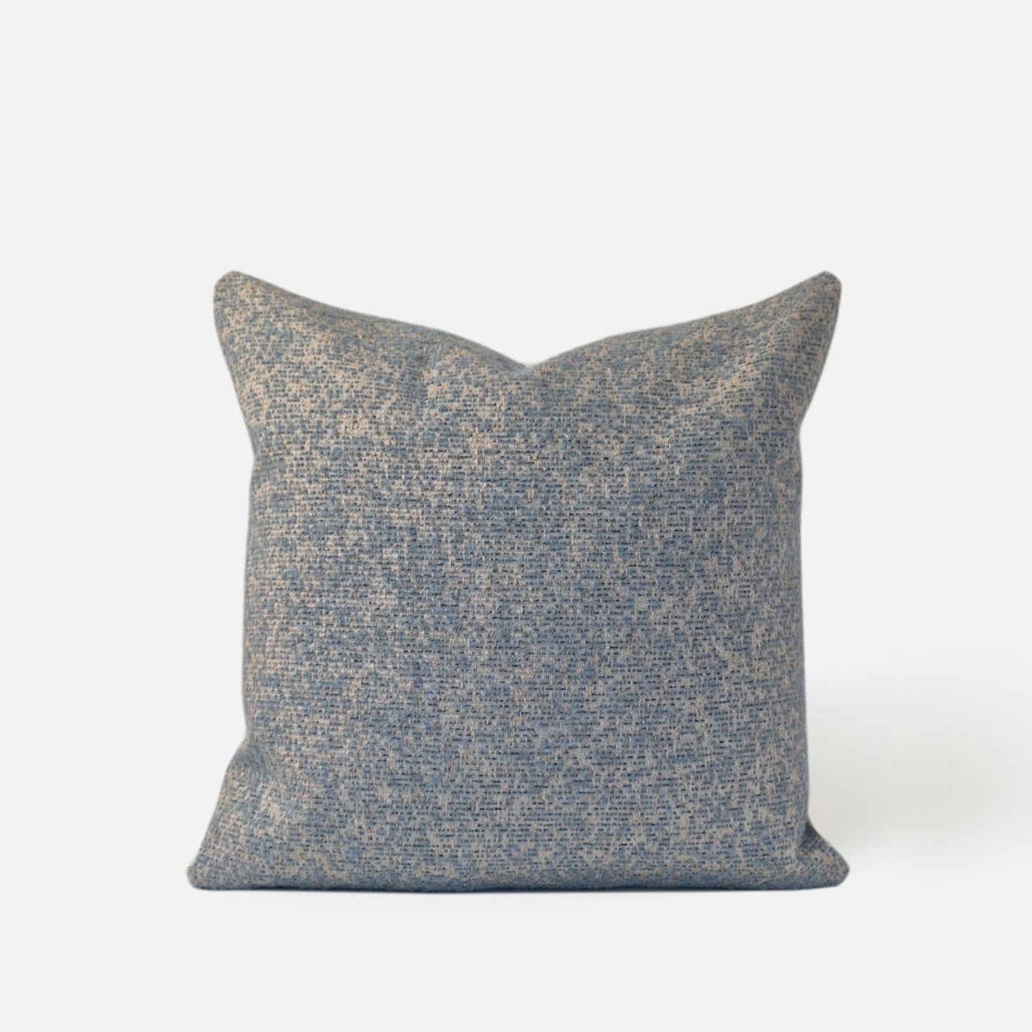 Decorative Threads light blue textured speckled cushion, front view on a white background