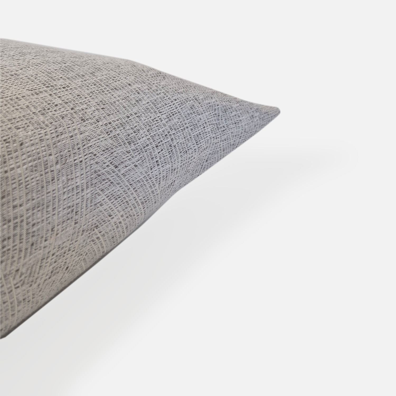 Decorative Threads Rain cushion cover in Grey with a woven texture, corner view