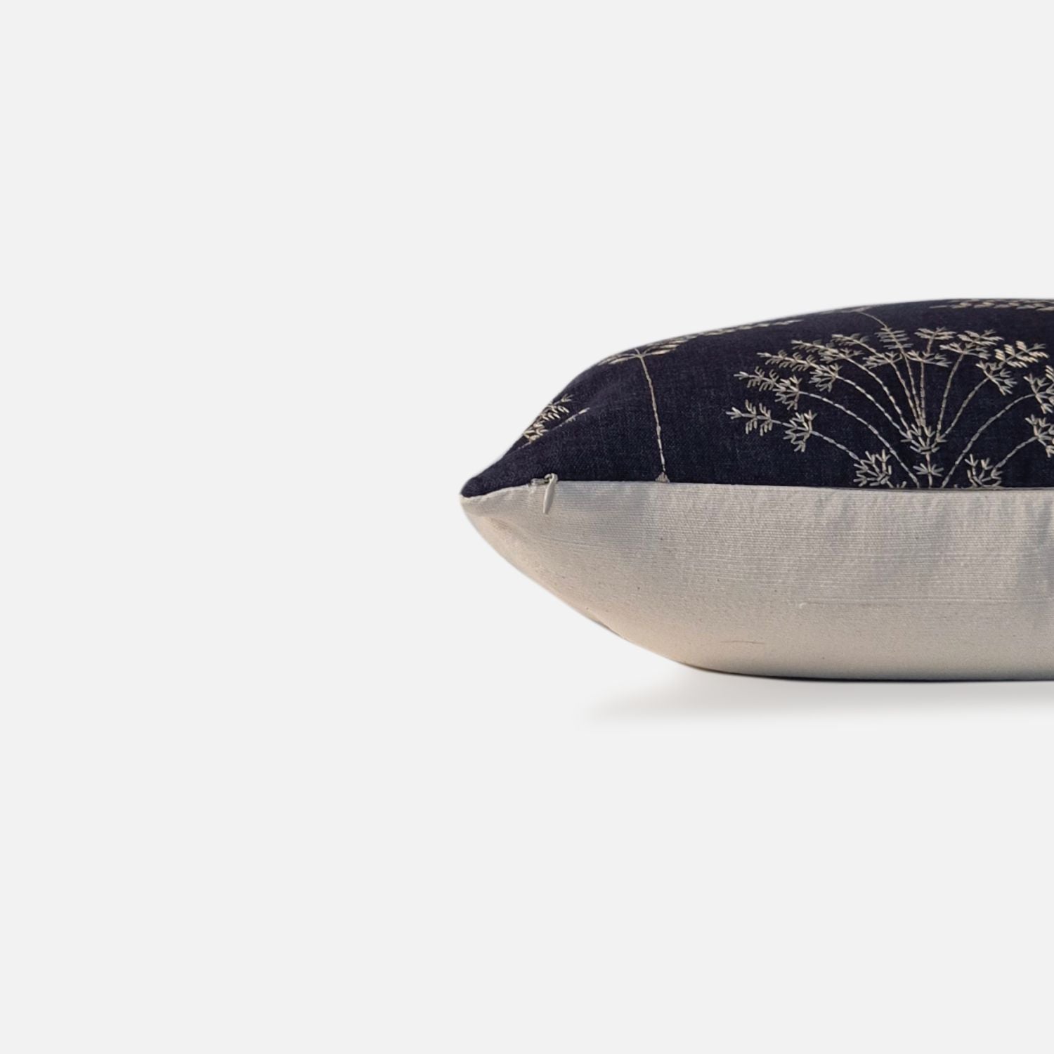 Decorative Threads Regal cushion cover in Midnight Blue/Ivory with an embroidered botanical design, side view on a white background