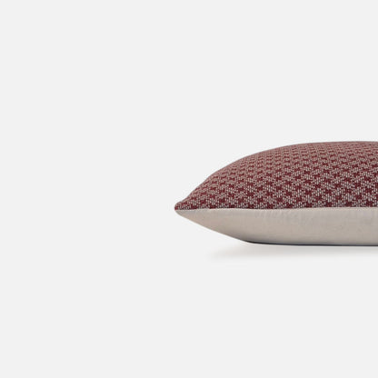 Decorative Threads Scarlet Serenity cushion cover combo. Ruby coloured Geometric Woven Cover, side view on a white background.