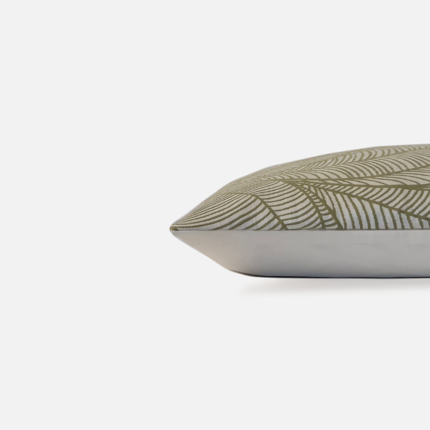 Decorative Threads Veined cushion cover in Wasabi with a woven botanical pattern, side view