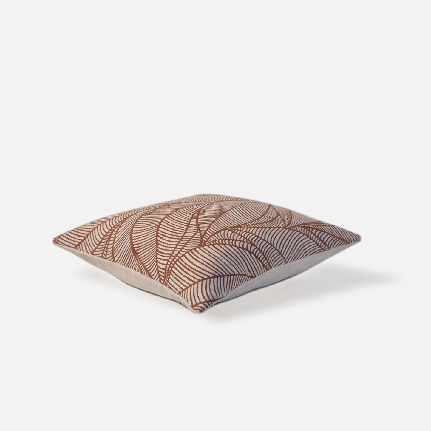 Decorative Threads Veined cushion cover in Pumpkin Spice with a woven botanical leaf pattern, top view