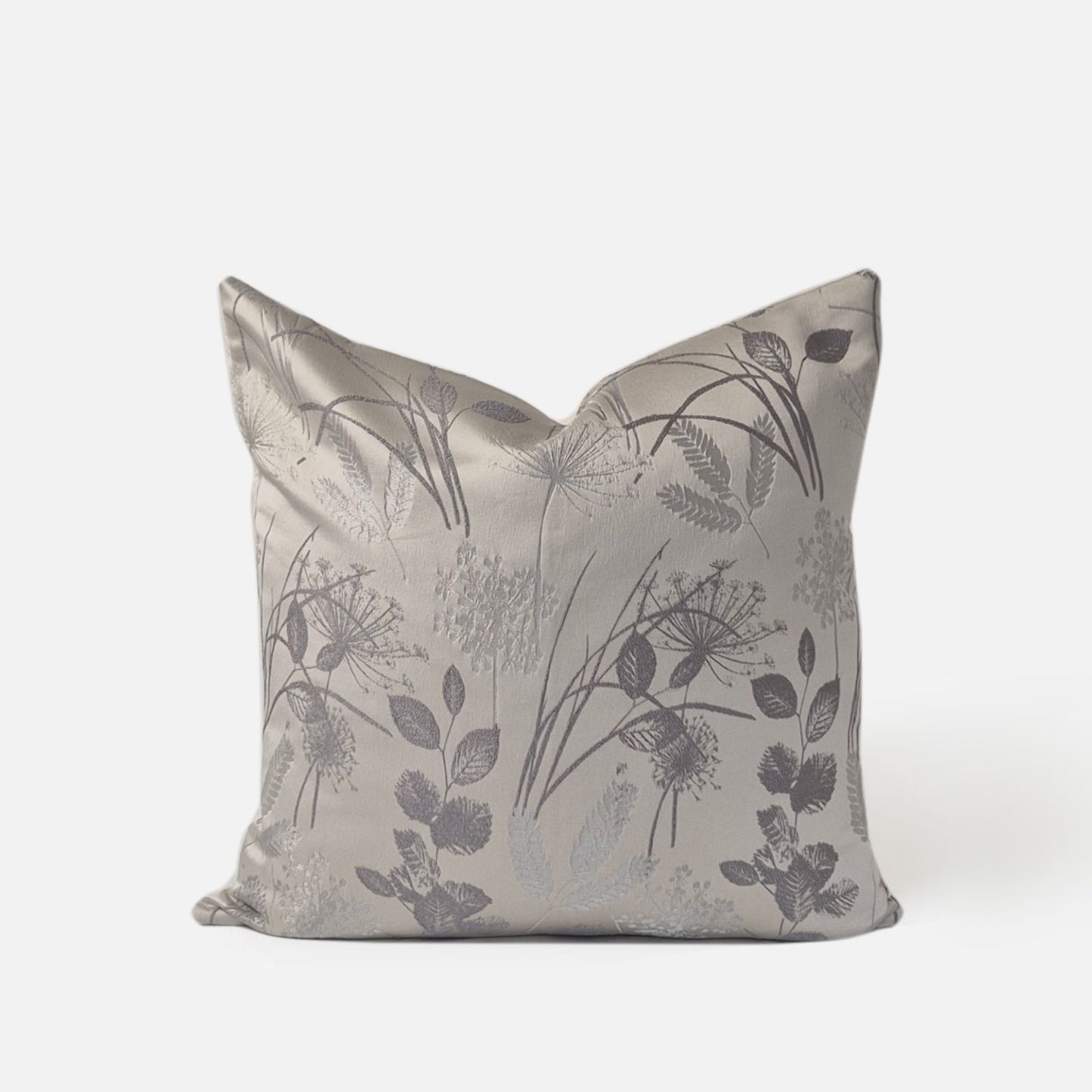 Decorative Threads Whimsical cushion cover in Silver with a woven texture, front view