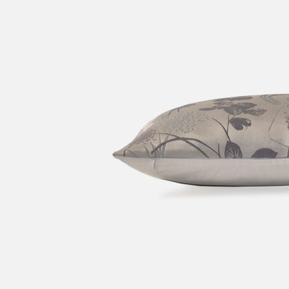 Decorative Threads Whimsical cushion cover in Silver with a woven texture, side view