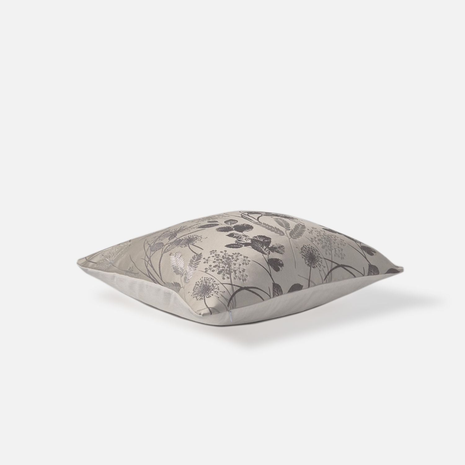 Decorative Threads Whimsical cushion cover in Silver with a woven texture, top view