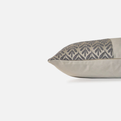 Decorative Threads Willow cushion cover in silver with a foliage woven design, side view